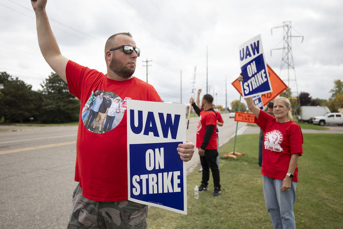 UAW members strike the General Motors Lansing Delta Assembly Plant in Lansing, Mich., on Sept. 29, 2023. The UAW clinched a deal with GM more than six weeks after the start of the auto strike.