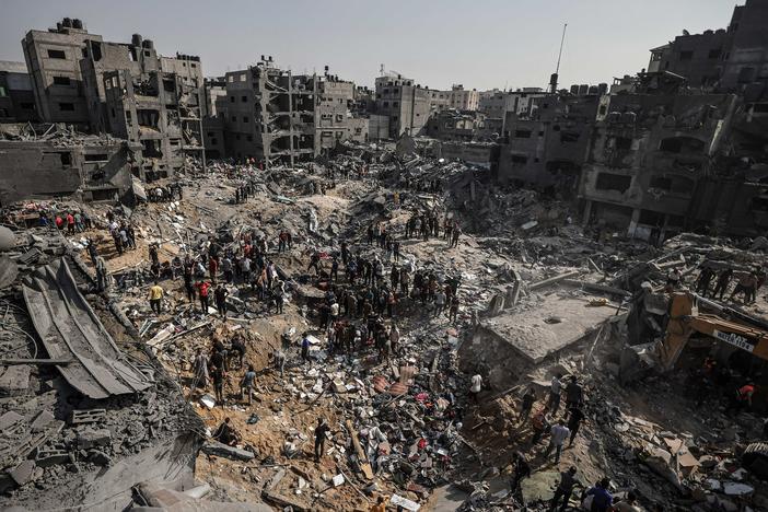 Palestinians conduct a search and rescue operation after the second bombardment by the Israeli army in the last 24 hours at Jabalia refugee camp in Gaza City, Gaza, on Wednesday.