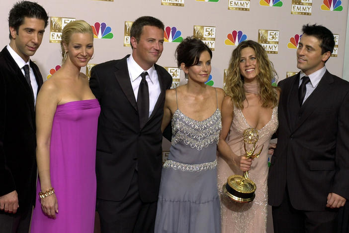 The stars of <em>Friends</em>, from left, David Schwimmer, Lisa Kudrow, Matthew Perry, Courteney Cox Arquette, Jennifer Aniston and Matt LeBlanc pose after the show won outstanding comedy series at the 54th Annual Primetime Emmy Awards in 2002.