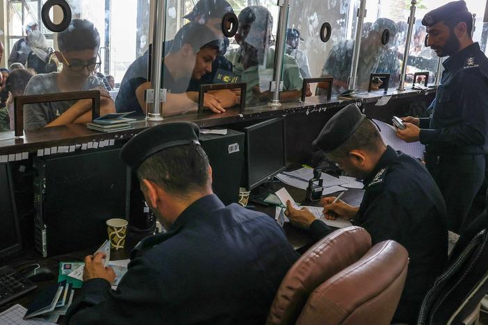 At least 300 civilians, all of them foreign citizens or dual nationals, departed Gaza Wednesday, and hundreds more were expected to leave Thursday.