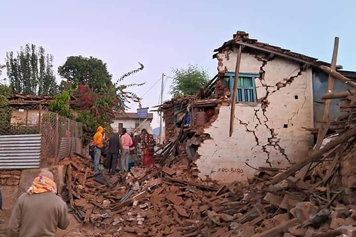 This handout photo provided by Nepal Prime Minister's Office shows an earthquake-affected area in northwestern Nepal on Saturday. Helicopters and ground troops rushed to help people hurt in a strong earthquake that shook northwestern Nepal districts just before midnight Friday.