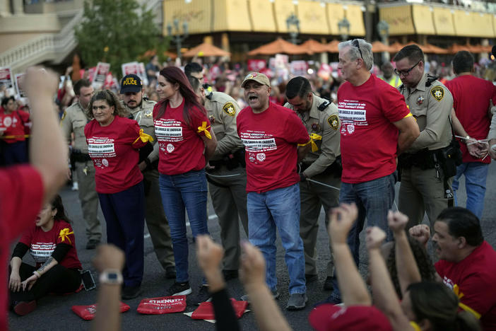 Las Vegas police arrest members of the Culinary Workers Union during a rally along the Strip on Oct. 25 in Las Vegas.