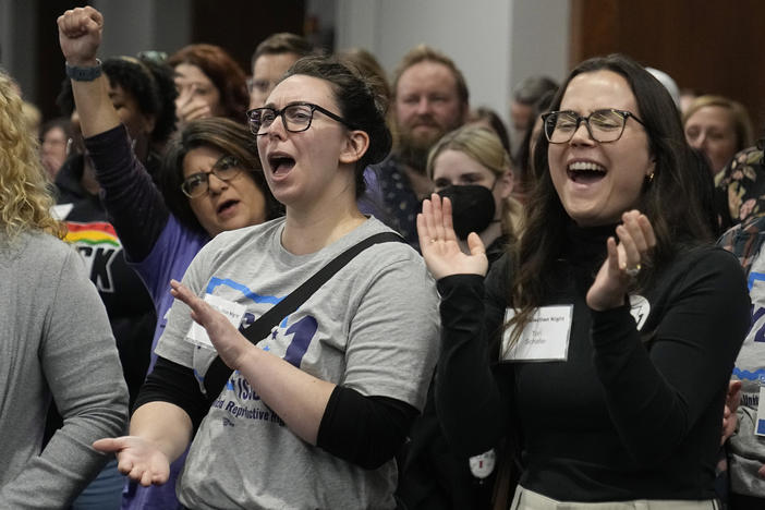Issue 1 supporters cheer at a watch party Tuesday in Columbus, Ohio.