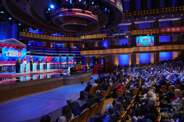 Republican presidential candidates from left, former New Jersey Gov. Chris Christie, former U.N. Ambassador Nikki Haley, Florida Gov. Ron DeSantis, businessman Vivek Ramaswamy and Sen. Tim Scott, R-S.C., participate in a Republican presidential primary debate hosted by NBC News Wednesday in Miami.