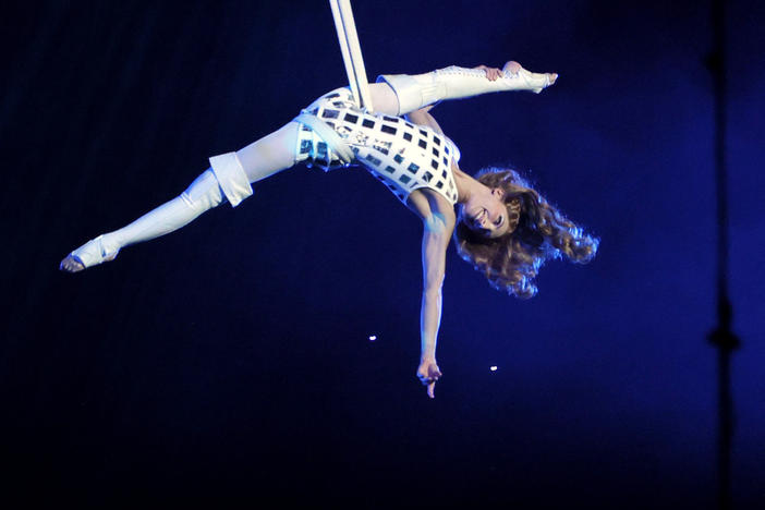 Cirque du Soleil is unveiling a plan to join its famous acrobatic shows with Nashville's country music. Here, a cast member performs during the The Beatles LOVE show by Cirque du Soleil at The Mirage in Las Vegas.