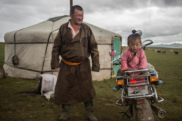 Grandfather and granddaughter outside the family ger â or yurt. A study of Mongolians studied living in gers showed higher rates of satisfaction than those living in urban housing, a finding the authors relate to the Mongolian emphasis on nature and freedom.