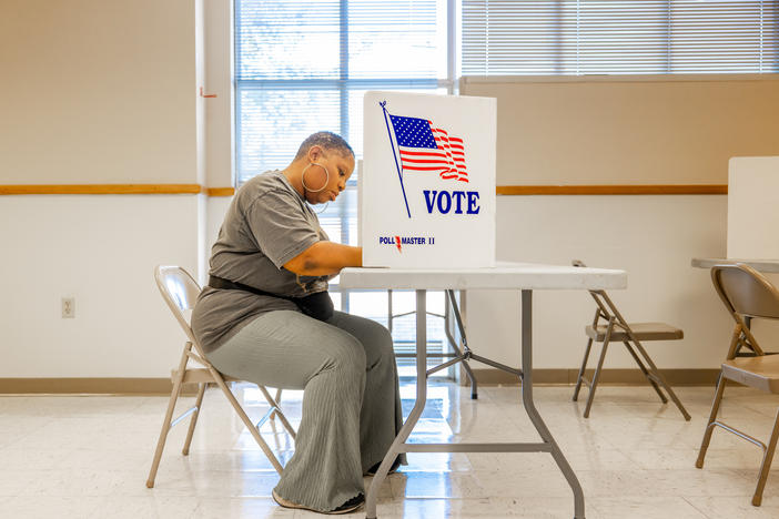 A voter fills out a ballot in Jackson, Miss., on Tuesday. Federal and local officials have worked closely with researchers to track rumors and conspiracy theories in recent elections but that cooperation is fading under pressure from conservatives.