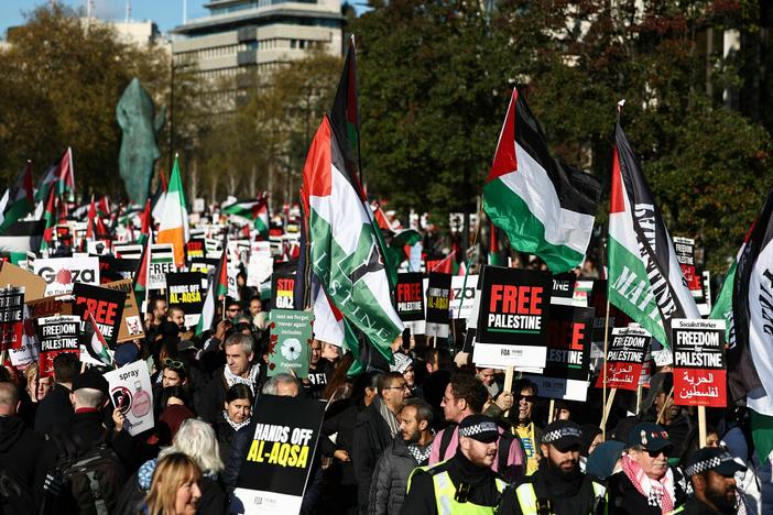 Protesters march in central London on Saturday, calling for a cease-fire in the conflict between Israel and Hamas.