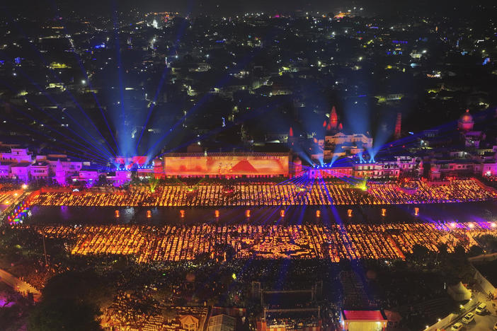 Lamps light up the banks of the river Saryu on the eve of the Hindu festival of Diwali, in Ayodhya, India, Saturday, Nov. 11, 2023.