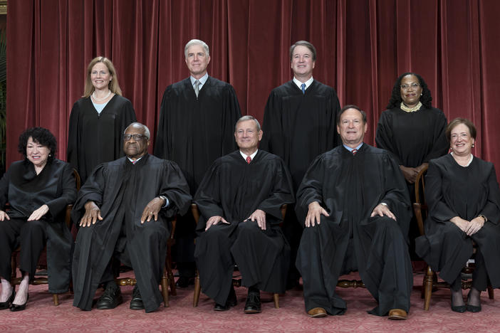 Members of the Supreme Court sit for a group portrait following the addition of Associate Justice Ketanji Brown Jackson last October.