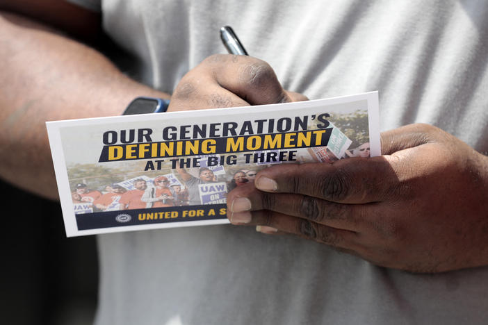 The United Auto Workers union and the Big 3 automakers say the record contract deals reached after a six-week strike will be life-changing for autoworkers. But some lament the gains don't fully make up for past concessions.