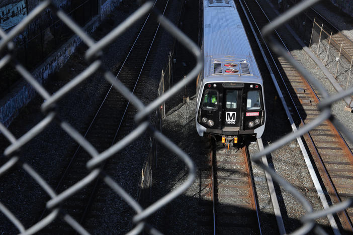 A Metro train car travels along the Red Line in Washington, D.C. Since the COVID-19 pandemic, riders have slowly returned to taking mass transit.