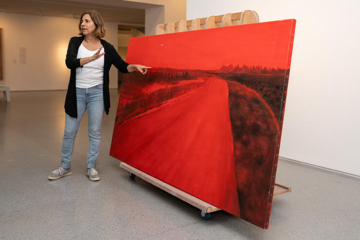 Rescued from her studio in Kibbutz Be'eri near Israel's border with Gaza, artist Ziva Jelin's damaged painting <em>Curving Road </em>is currently on special display in the Israeli Art gallery of the Israel Museum in Jerusalem.