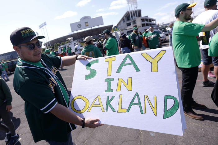 Reuben Ortiz of Modesto, Calif., holds a sign outside Oakland Coliseum to protest the Oakland Athletics' planned move to Las Vegas before the A's game with the Tampa Bay Rays on June 13, 2023. The Athletics' move to Las Vegas was unanimously approved Thursday, Nov. 16, 2023 by Major League Baseball team owners.