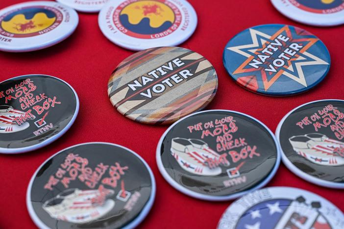 Pins are pictured at a display counter during a cultural meeting at the Comanche Nation fairgrounds in Lawton, Okla., on Sept. 30.