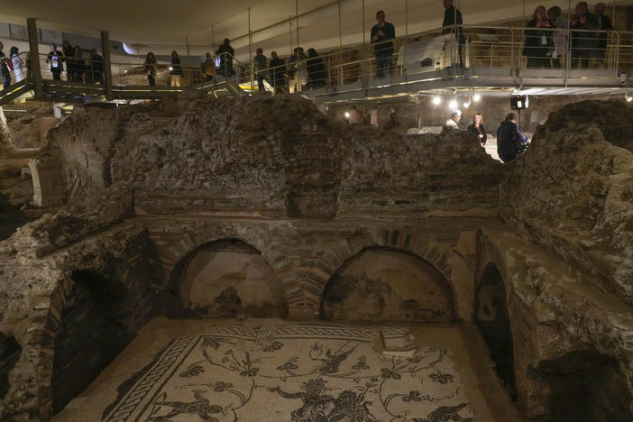 Visitors explore the Roman Necropolis at The Vatican.