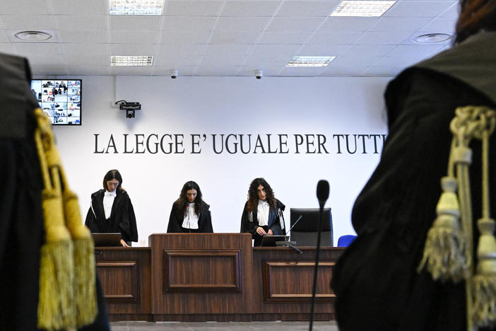 The president of the court reads the verdicts of a maxi-trial of hundreds of people accused of membership in Italy's 'ndrangheta organized crime syndicate.