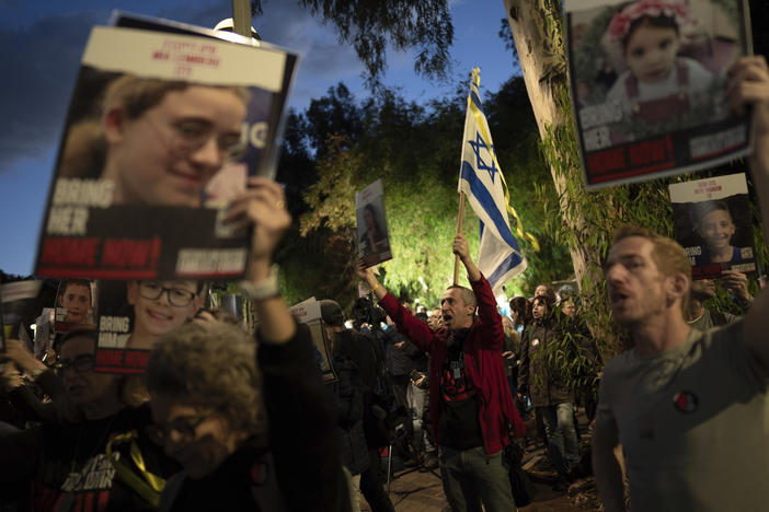 Demonstrators call for the return of 40 children who are among the roughly 240 hostages believed held by Hamas militants in the Gaza Strip as they mark World Children's Day during a protest across from UNICEF offices in Tel Aviv, Israel, on Monday.