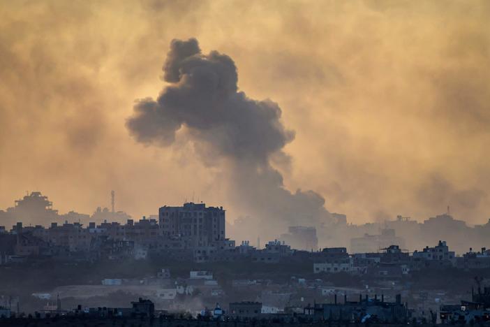 This picture taken from a position in southern Israel near the border with the Gaza Strip shows smoke billowing in the the Palestinian territory after an Israeli strike on November 21, 2023, amid ongoing battles between Israel and the Palestinian Hamas movement.