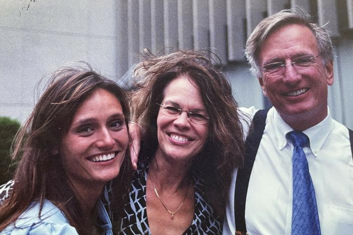 This is me with my parents at my grad school graduation in the Spring of 2004.