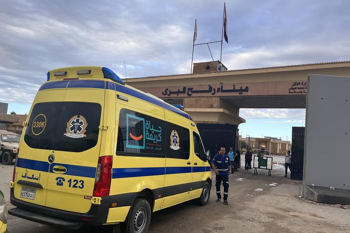 An Egyptian ambulance prepares to enter the Gaza Strip on Nov. 15 through the Rafah crossing, to transport critically wounded Palestinians for treatment to Egypt.