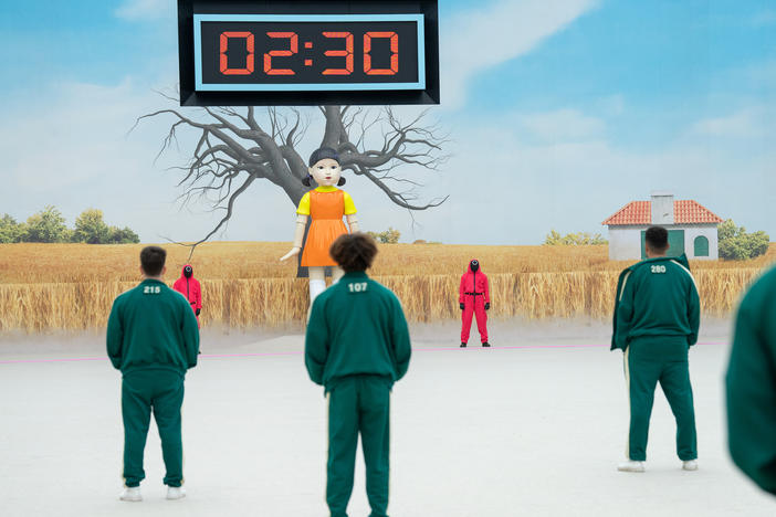 A U.K.-based law firm said at least two contestants felt "unwell" after standing for hours in cold temperatures during a taping for <em>Squid Game: The Challenge. </em>The reality competition was inspired by the hit South Korean drama.