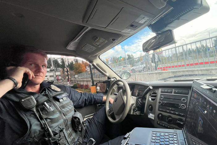 Sgt Casey Hiam of the Bellevue. WA police department on an anti-shoplifting stakeout operation during the holiday shopping season