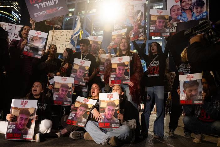 Families of the hostages, and their supporters, call for the release of all the hostages during a demonstration outside The Kirya ahead of the war cabinet meeting on the fifth day of the temporary truce on Tuesday in Tel Aviv, Israel.