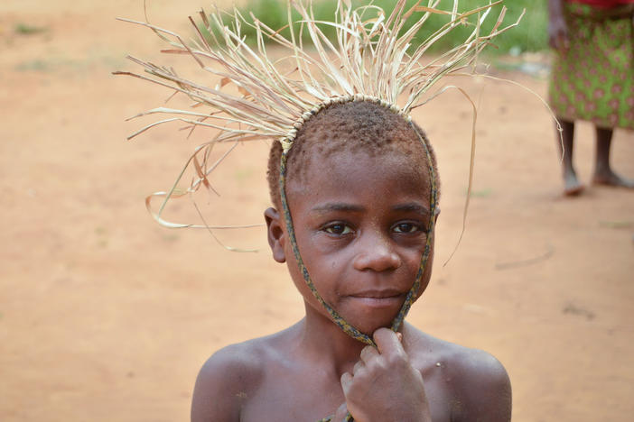 A child from the Mbendjele people, a hunter-gatherer community that lives in the northern rainforests of the Republic of Congo. A new study found that children in this society have on average 8 caregivers in addition to the mother to provide hands-on attention.