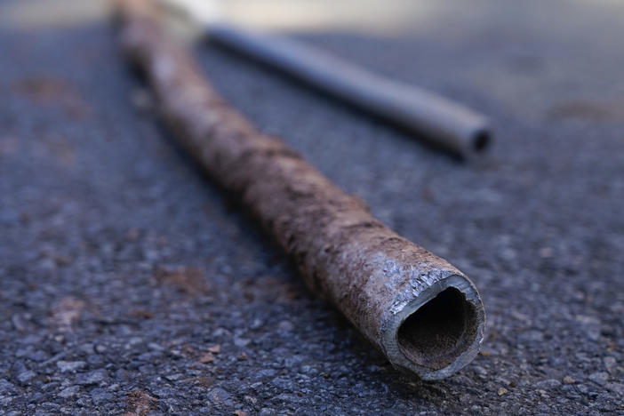 Lead water pipes pulled from underneath the street in Newark, N.J., in 2021.