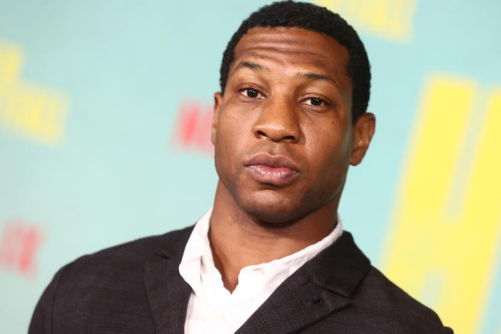 Jonathan Majors faces misdemeanor charges of harassment and assaulting a former girlfriend. He's shown above in Los Angeles in October 2021.