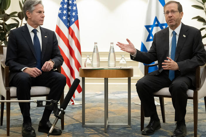 U.S. Secretary of State Antony Blinken, left, and Israel's President Isaac Herzog meet in Tel Aviv, Israel, on Thursday following the announcement of an extension of the truce between Israel and Hamas just before it was due to expire.