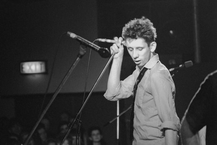 Shane MacGowan live onstage in 1988, courtesy of the documentary film <em>Crock of Gold: A Few Rounds With Shane MacGowan</em>.