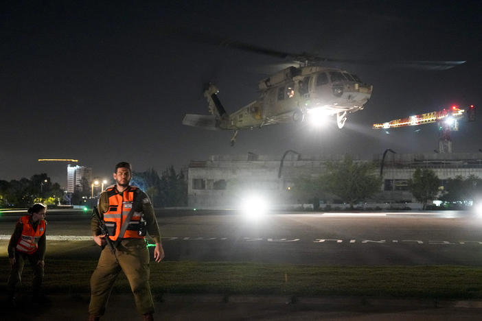 An Israeli Air Force helicopter carrying an Israeli hostage released by Hamas lands at the Sheba Medical Center in Ramat Gan, Israel, Thursday, Nov. 30, 2023.