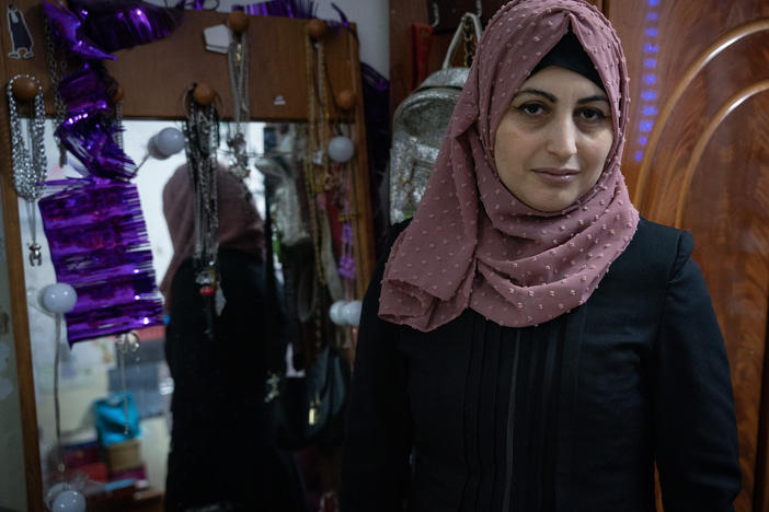 Rimah Shahada poses in her daughter Aseel's bedroom in Qalandiya refugee camp in Ramallah, West Bank Nov. 22.