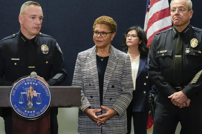 Beverly Hills Police Chief Mark Stainbrook, left, Mayor Karen Bass and Los Angeles Police Chief Michel Moore announce the arrest of a suspect in three recent killings of homeless men, Saturday, Dec. 2, 2023, in Los Angeles.
