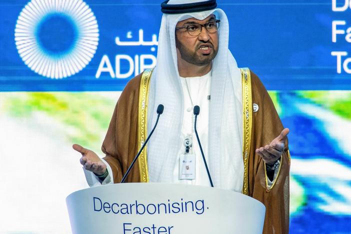 Sultan al-Jaber is the president of this year's climate talks and the head of the UAE's state-run oil company. Oil companies have a big platform at the climate conference, and experts say their language is important because it can make it into policy.