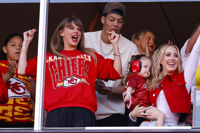 Taylor Swift celebrates a touchdown during the Kansas City Chiefs and Los Angeles Chargers game at Arrowhead Stadium on Oct. 22 in Kansas City, Mo.