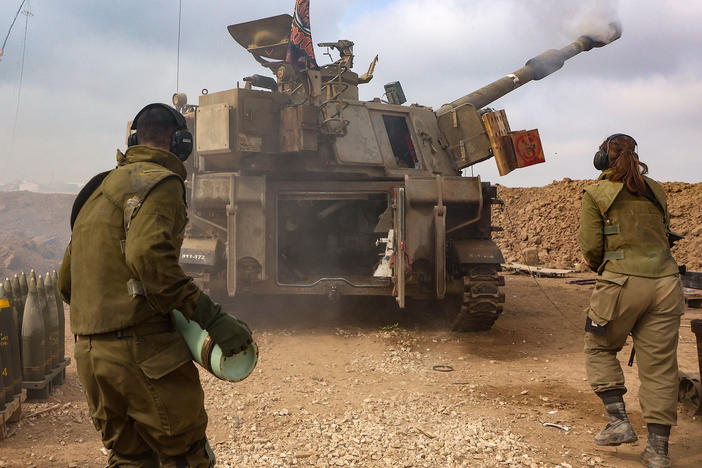 An Israeli artillery unit is pictured near the border with the Gaza Strip on Tuesday, amid continuing battles between Israel and the militant group Hamas.