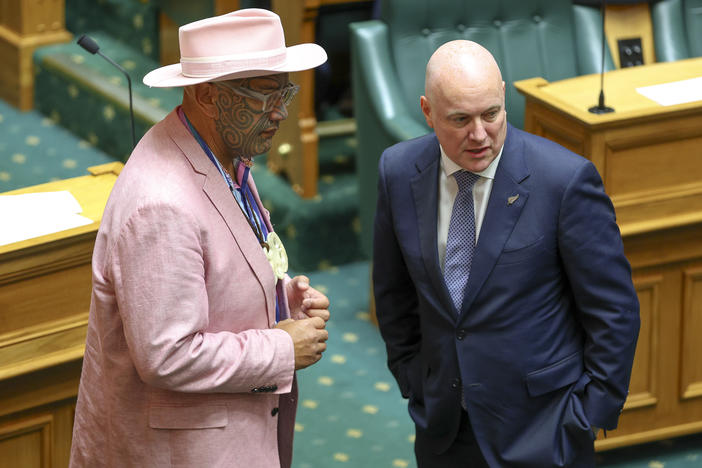 Māori Party co-leader Rawiri Waititi speaks to Prime Minister Christopher Luxon during the State Opening of Parliament on December 6 in Wellington, New Zealand. Luxon has called for the abolishment of tough anti-smoking measures — and the Māori Health Authority.