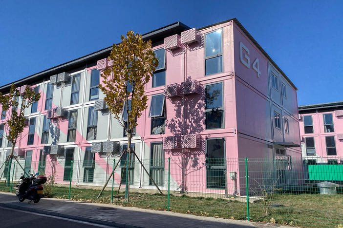 Zone G in a quarantine center turned housing units. The complex is divided into nine zones, named after letters from A to L, a design that was meant to make quarantine management convenient. Inside each window of the building is a 190-square-foot studio, equipped with a bed, a sofa and a bathroom.