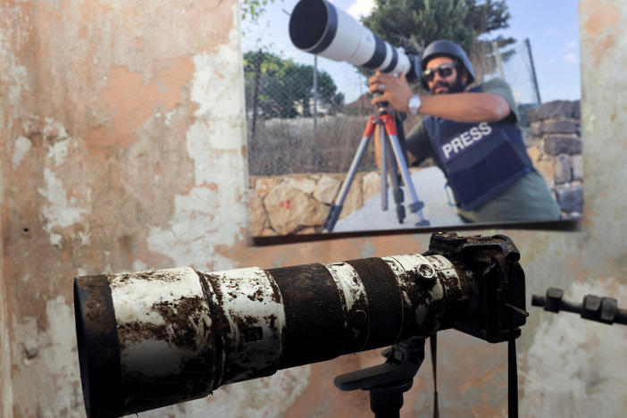 The camera that belonged to Reuters journalist Issam Abdallah, who was killed by what a Reuters investigation has found was an Israeli tank crew, is displayed during a press conference by Amnesty International and Human Rights Watch in Beirut, Lebanon, on Thursday.