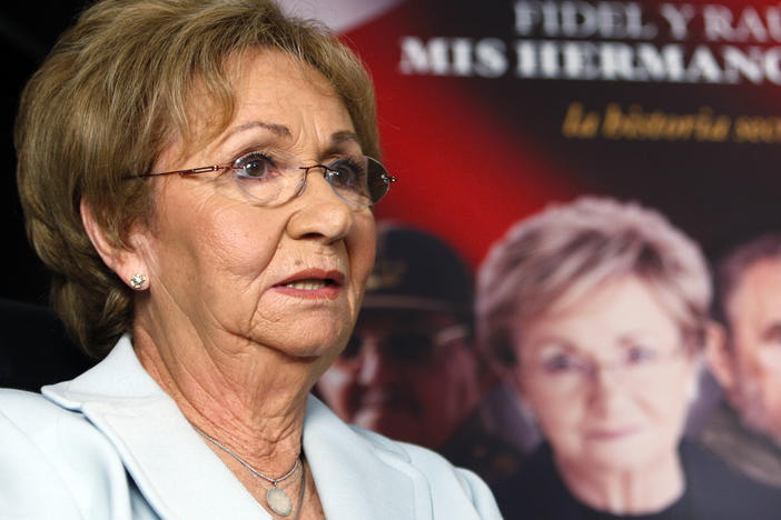 Juanita Castro, sister of Fidel Castro, talks to a reporter, Oct. 27, 2009, in Miami. Juanita Castro, the anti-communist sister of Cuban rulers Fidel and Raul Castro who worked with the CIA against their government, has died in Miami at age 90.