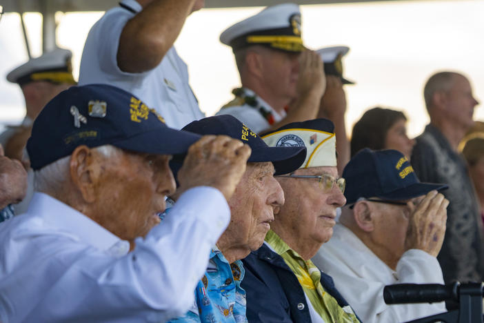Pearl Harbor survivors, from left, Harry Chandler, Ken Stevens, Herb Elfring and Ira "Ike" Schab salute while the National Anthem is played during the 82nd Pearl Harbor Remembrance Day ceremony on Thursday, Dec. 7, 2023, at Pearl Harbor in Honolulu, Hawaii.