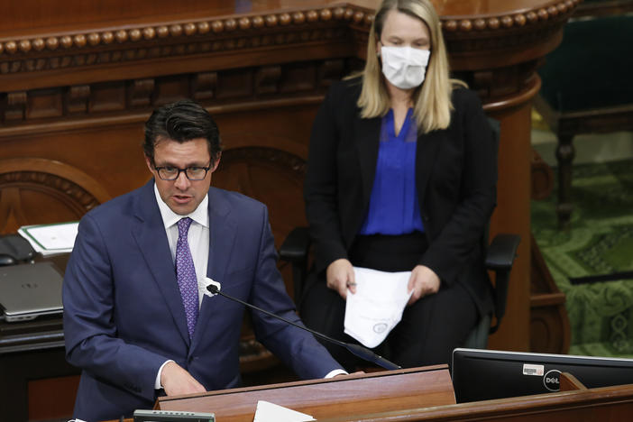 Legislative Analyst Gabriel Petek, left, discusses Gov. Gavin Newsom's proposed 2020-21 revised state budget during a hearing the state Capitol in Sacramento, Calif., May 26, 2020. On Thursday, Dec. 7, 2023, Petek said California is facing a $68 billion budget deficit.