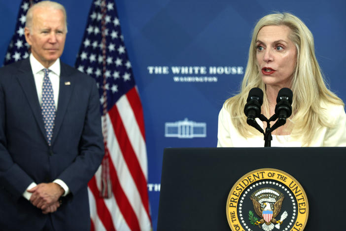 Lael Brainard speaks as President Joe Biden listens during an announcement in Nov. 2021.