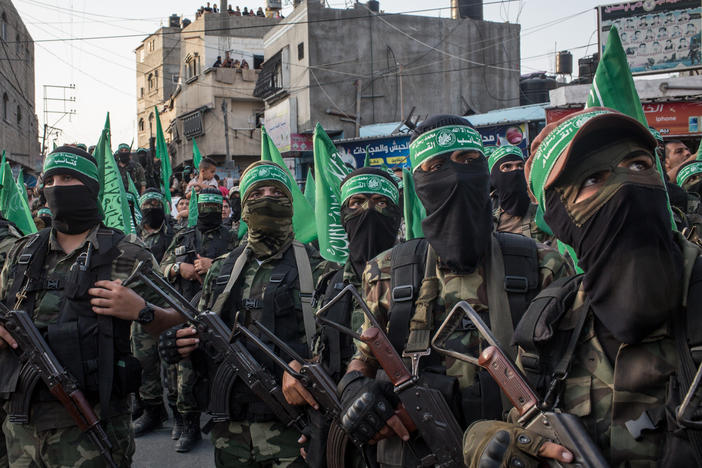 Palestinian Hamas militants are seen during an event in the Bani Suheila district of Gaza City, Gaza Strip, on July 20, 2017.