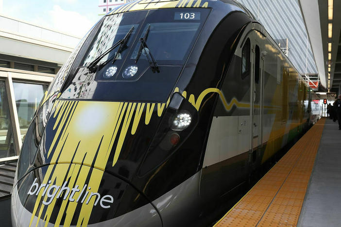 A Brightline train during its inaugural trip between Miami and West Palm Beach, Fla., in 2018. This week, the White House announced $3 billion in funding for Brightline West, a proposed high-speed rail line connecting Las Vegas and Southern California.