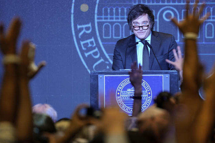 President-elect Javier Milei takes questions from the press after his victory in the presidential runoff election, in Buenos Aires, Argentina, Nov. 19, 2023.