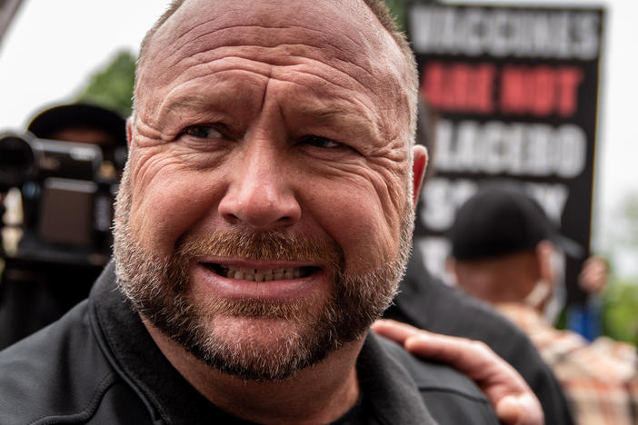 AUSTIN, TX - APRIL 18: Infowars founder Alex Jones interacts with supporters at the Texas State Capital building on April 18, 2020 in Austin, Texas. (Photo by Sergio Flores/Getty Images)